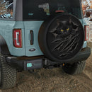 Black Cat Tearing Through Car Spare Tire Cover