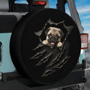 Cute Pug Peeking Through Torn Car Spare Tire Cover