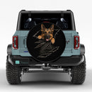 German Shepherd Torn Through Car Spare Tire Cover With Camera Hole