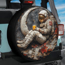 A Vintage Metal Plate Astronaut Jeep Car Spare Tire Cover