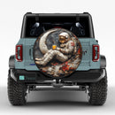 A Vintage Metal Plate Astronaut Jeep Car Spare Tire Cover