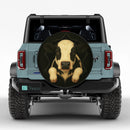 Cow In A Torn Fabric Jeep Car Spare Tire Cover
