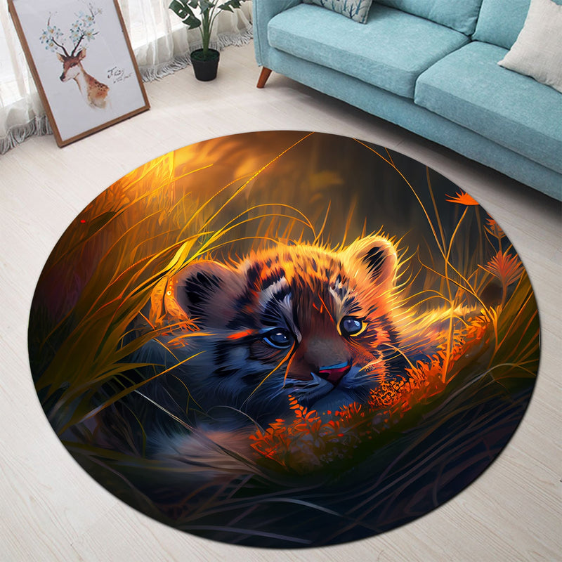 Cute Baby Tiger Bedded Down In The Grass Round Rug