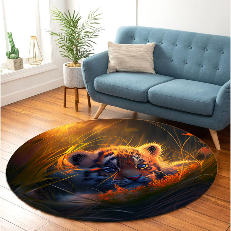 Cute Baby Tiger Bedded Down In The Grass Round Rug