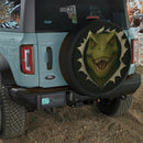 Dinosaur In A Torn Fabric Car Spare Tire Cover
