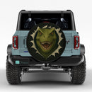 Dinosaur In A Torn Fabric Car Spare Tire Cover