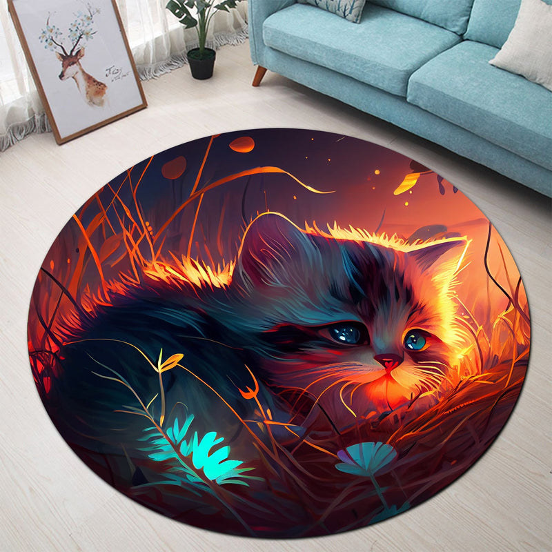 Kitten Bedded Down In The Grass Round Rug